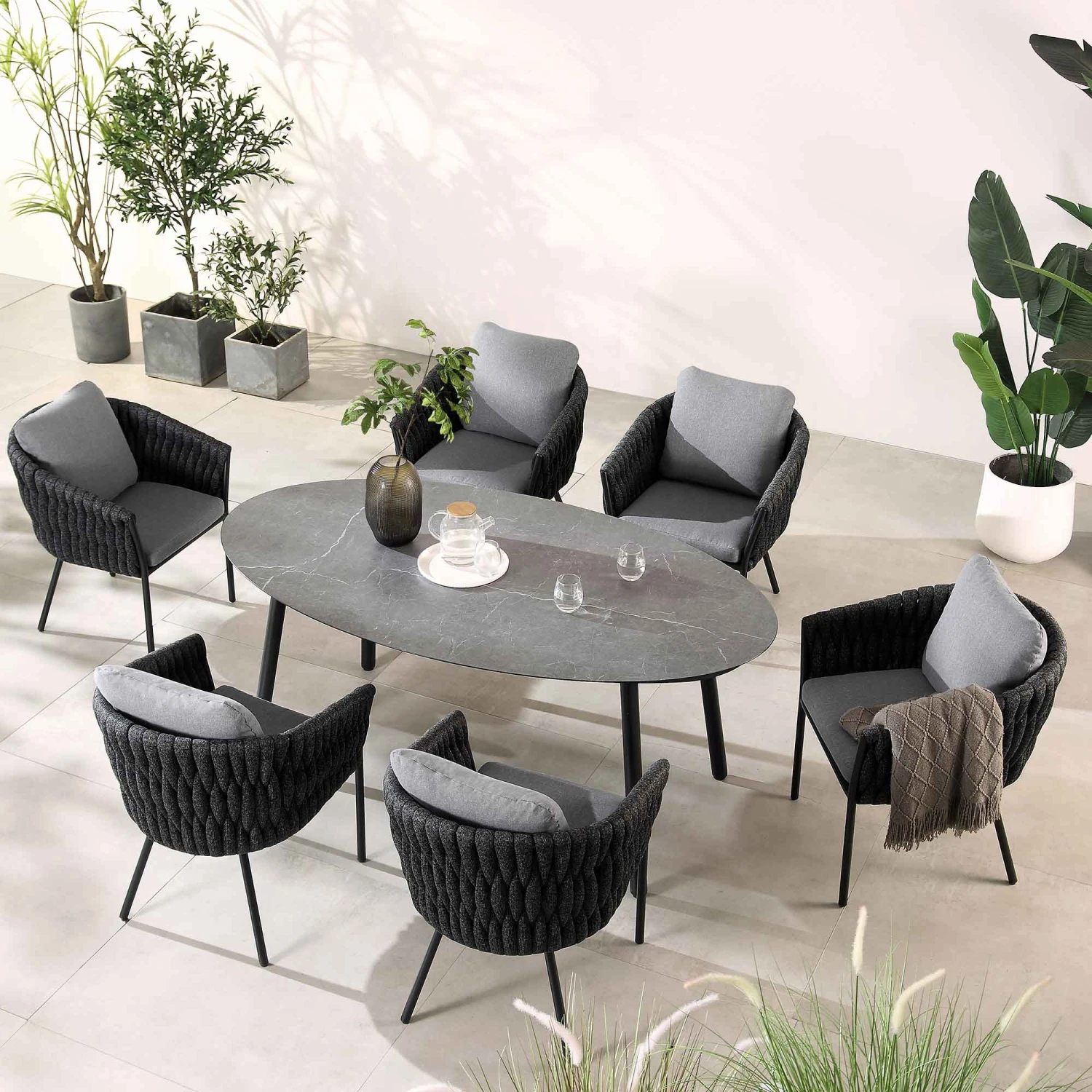 Montebello 6-Seater Outdoor Black Rope And Aluminium Oval Dining Set With Grey Ceramic Dining Table 4 Montebello 6-Seater Outdoor Black Rope And Aluminium Oval Dining Set With Grey Ceramic Dining Table - Image 2
